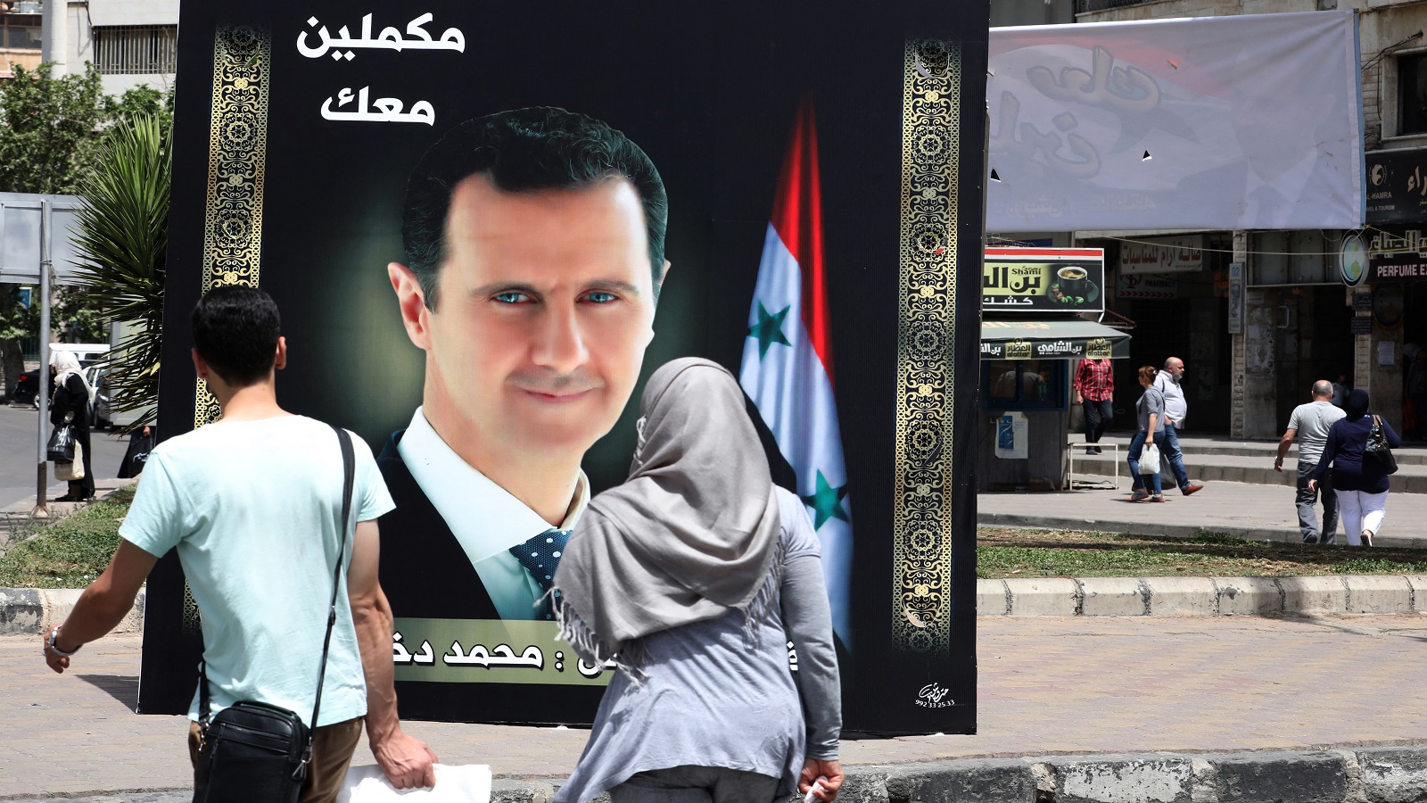 "الأمل بالعمل"..شعار الأسد الانتخابي الذي يتجاهل "انتصاراته"