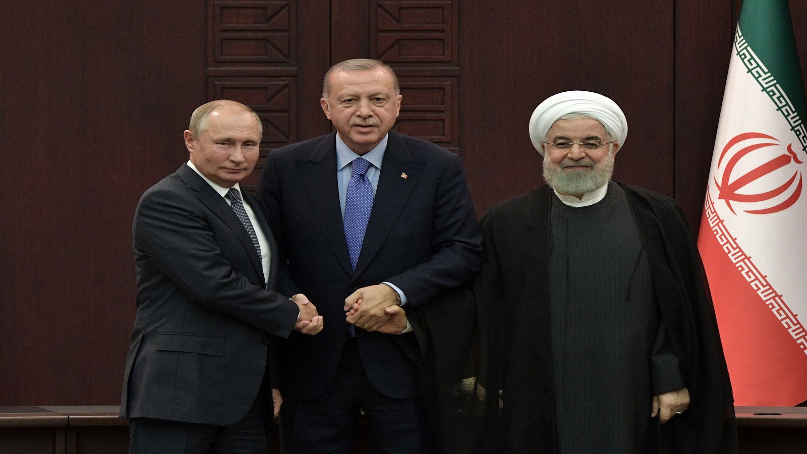 القمة الثلاثية:بوتين وروحاني يتحديان العقوبات على الاسد