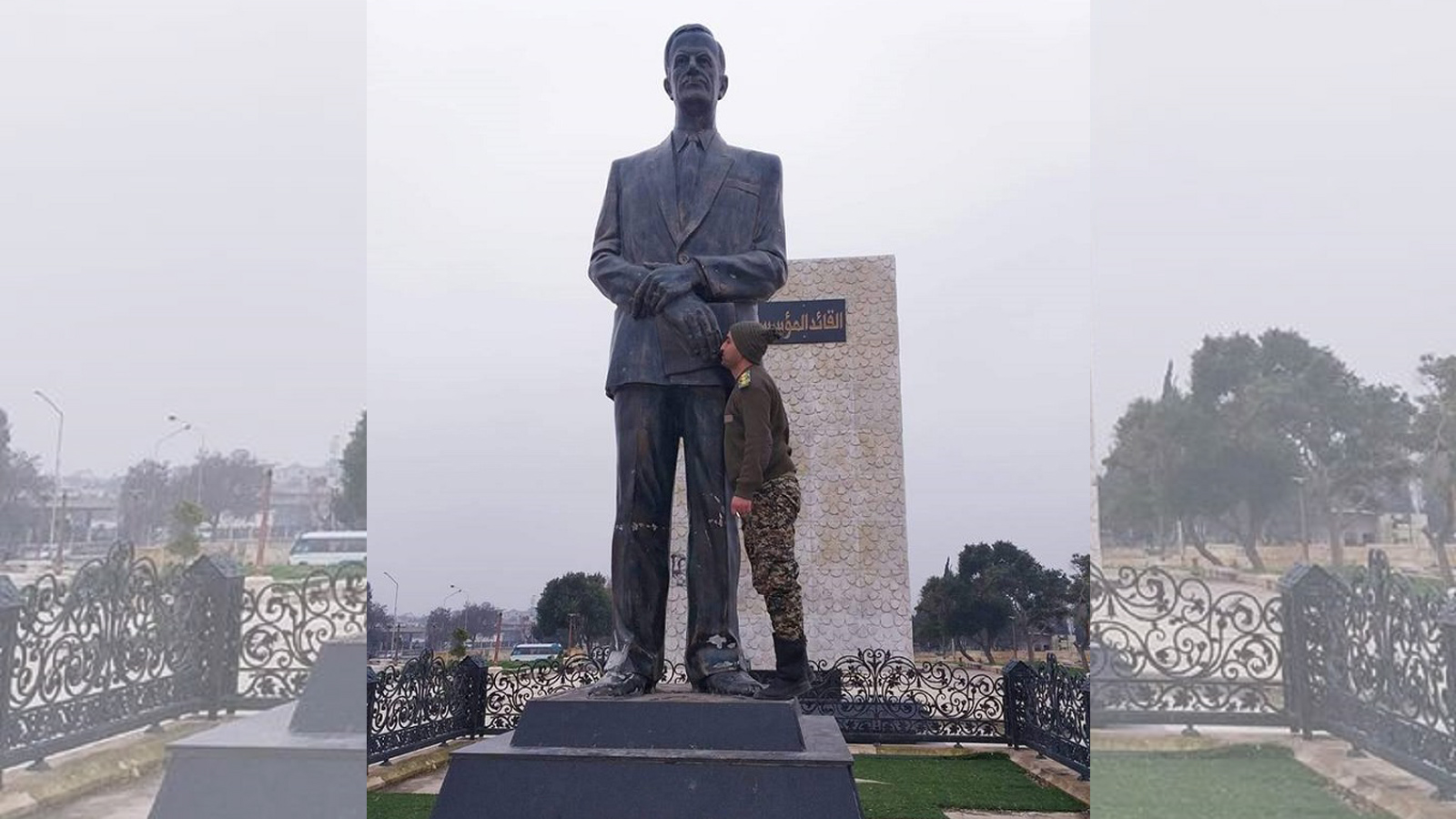 جندي يقبّل تمثال حافظ الأسد: الولاء لبشار وفاءً لوالده